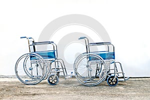 wheel chairs standby for help a old people