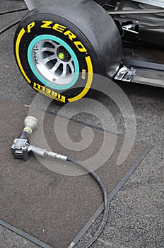 Wheel gun ready for use on a Formula one car.