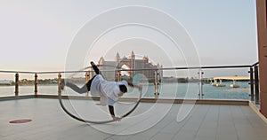 Wheel gymnastics tricks performed by a young athlete, spinning in a wheel, 4k