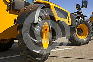 Wheel of the heavy building dozer of orange color