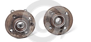 Wheel hub with bearing from old metal close-up on white isolated background in a photo studio. Seasonal repair of the suspension