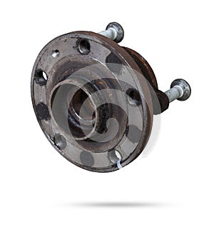 Wheel hub with bearing from old metal close-up on white isolated background in a photo studio. Seasonal repair of the suspension