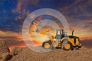 Wheel loader are digging the soil in construction site