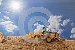 Wheel loader are digging the soil in the construction site