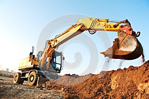 Wheel loader excavator