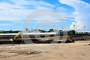 Wheel loader Excavator loading soil at eathmoving works