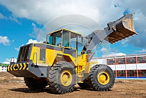Wheel loader excavator at work