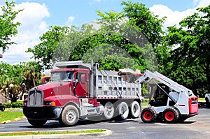 Wheel loader loading truck