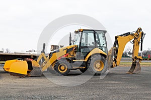 Wheel loader machine on the road