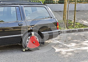 Wheel lock on an unpaid parked car