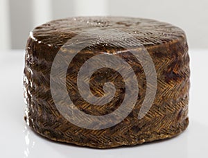 Wheel of manchego cheese photo