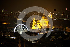 Wheel and night town