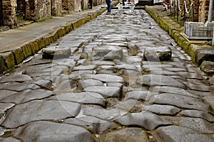 Wheel ruts of wagons on ancient streets of Pompei