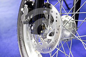 Wheel spokes and brake disc of a motorcycle