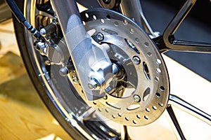 Wheel spokes and brake disc of a motorcycle