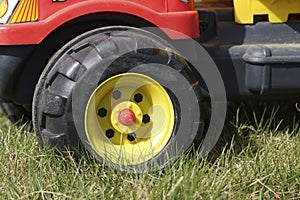 Wheel of a toy car.