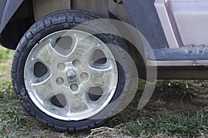 Wheel of a toy car.