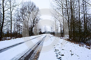 Wheel track on snow covered road