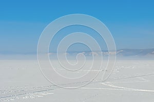 Wheel track on a snow field