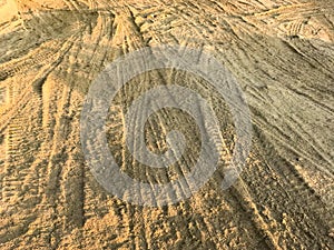 Wheel tracks dirt on country road