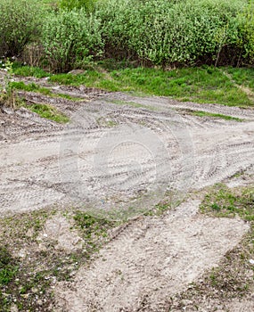 Wheel tracks on the dirt road