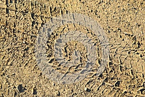 Wheel tracks on sand ground texture