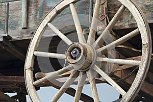 A Wheel and Undercarriage of a Buckboard Wagon