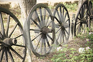 Wheel vehicles with old wooden house