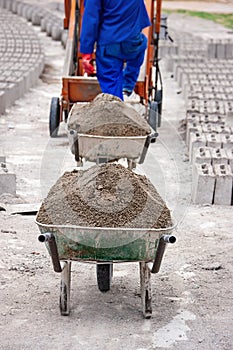Wheelbarrow and bricks
