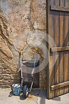 Wheelbarrow and door