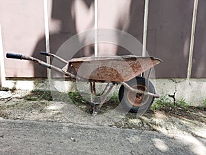 wheelbarrows are commonly used for house construction