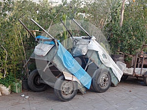 Wheelbarrows lying idle on a street in Marrakech, Morocco