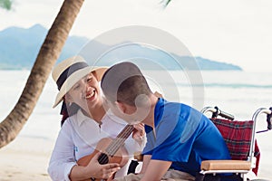 Wheelchair activity outdoor with family on travel holiday