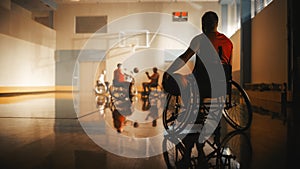 Wheelchair Basketball Game: Player Wearing Red Shirt Holding Ball Waiting for His Turn. Athlete Wa
