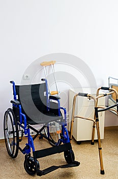 Wheelchair, crutches and walker. Medical equipment for disabled and elderly person.