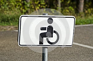 Wheelchair Handicap Sign in resort park road