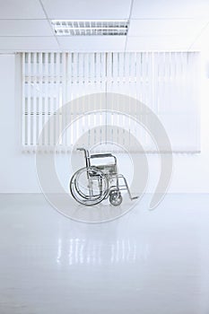 Wheelchair at the hospital walkway. Conceptual image shot