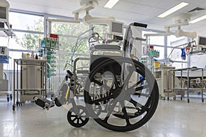 Wheelchair in  intensive care unit in hospital,  a place where can be treated patients with pneumonia caused by coronavirus covid