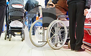 Wheelchair invalid in shop photo