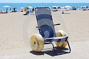 Wheelchair with large inflatable wheels to go in the sea