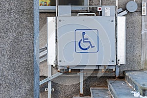 Wheelchair lift. Pallet lift near the public building