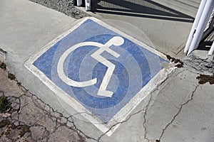 wheelchair ramp with accessibility symbol