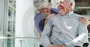 Wheelchair, senior nurse and elderly man hug, talking or happy for healthcare in nursing home. Disability, female