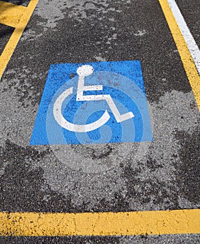 Wheelchair symbol on a car reserved parking