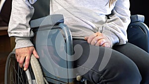 Wheelchair user manoeuvering in house