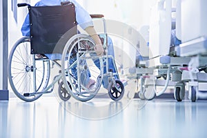 Wheelchairs,patient is sitting in a wheelchair photo