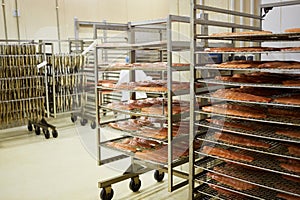 Wheeled racks with red fish fillet and smoked photo