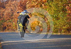 Wheelie on motorcycle photo