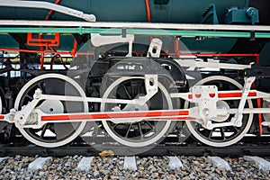 Wheels and connecting rod of old steam locomotive