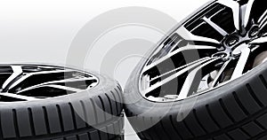 Wheels with modern alu rims on white background, close-up banner